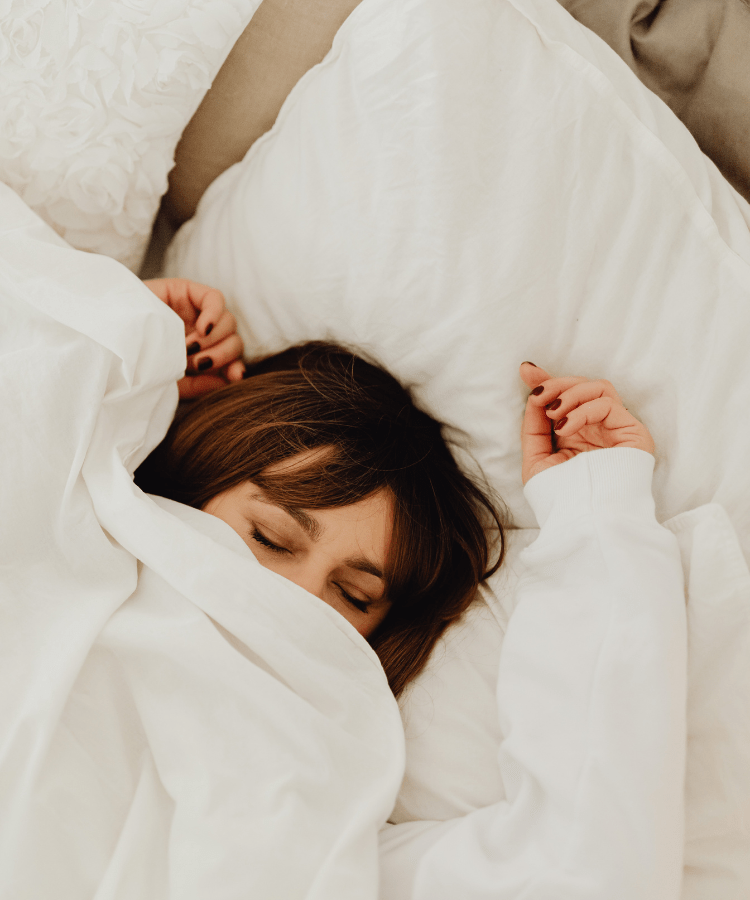 Person relaxed and reading before bed, at ease